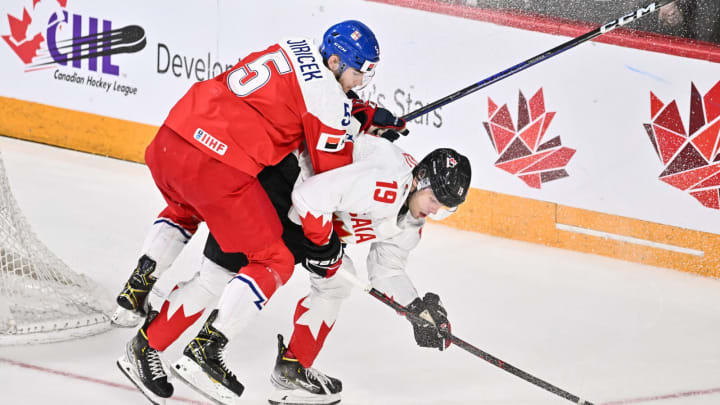 HALIFAX, CANADA – JANUARY 05: David Jiricek #5 of Team Czech Republic defends against Adam Fantilli #19 of Team Canada during the first period in the gold medal round of the 2023 IIHF World Junior Championship at Scotiabank Centre on January 5, 2023 in Halifax, Nova Scotia, Canada. (Photo by Minas Panagiotakis/Getty Images)