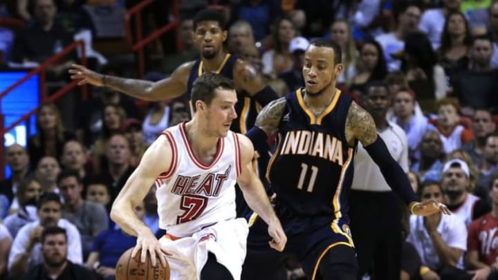 Feb 22, 2016; Miami, FL, USA; Miami Heat guard Goran Dragic (7) dribbles the ball as Indiana Pacers guard Monta Ellis (11) defends in the second half at American Airlines Arena. The Heat won 101-93. Mandatory Credit: Robert Mayer-USA TODAY Sports