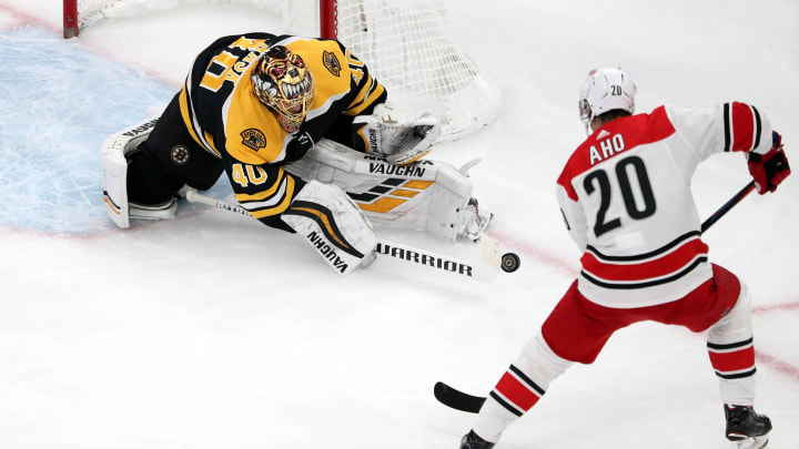 BOSTON, MASSACHUSETTS – MAY 09: Tuukka Rask #40 of the Boston Bruins makes a save against Sebastian Aho #20 of the Carolina Hurricanes during the second period in Game One of the Eastern Conference Final during the 2019 NHL Stanley Cup Playoffs at TD Garden on May 09, 2019 in Boston, Massachusetts. (Photo by Adam Glanzman/Getty Images)