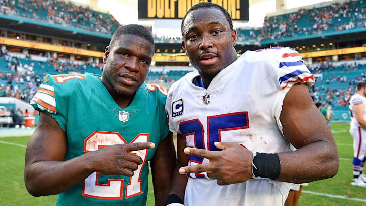 MIAMI, FL – DECEMBER 02: Frank Gore #21 of the Miami Dolphins and LeSean McCoy #25 of the Buffalo Bills after the game at Hard Rock Stadium on December 2, 2018 in Miami, Florida. (Photo by Mark Brown/Getty Images)