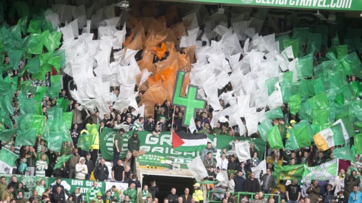 GLASGOW, SCOTLAND - MAY 24: Fans at Celtic celebrates 4 titles in a row at the Scottish Premiership match between Celtic and Inverness Caley Thistle at Celtic Park on May 24, 2015 in Glasgow, Scotland. (Photo by Jeff Holmes/Getty Images)
