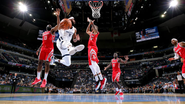 MEMPHIS, TN – OCTOBER 12: Mike Conley #11 of the Memphis Grizzlies handles the ball against the Houston Rockets during a pre-season game on October 12, 2018 at FedExForum in Memphis, Tennessee. NOTE TO USER: User expressly acknowledges and agrees that, by downloading and or using this photograph, User is consenting to the terms and conditions of the Getty Images License Agreement. Mandatory Copyright Notice: Copyright 2018 NBAE (Photo by Joe Murphy/NBAE via Getty Images)