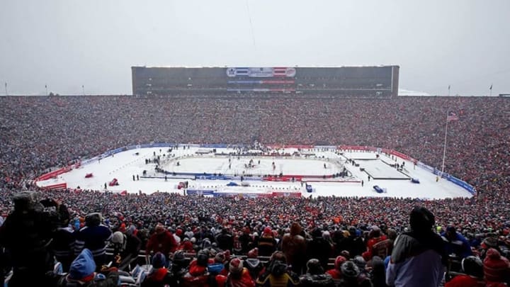 Jan 1, 2014; Ann Arbor, MI, USA; A general view of the opening puck drop in the first period during the 2014 Winter Classic hockey game between the Detroit Red Wings and the Toronto Maple Leafs at Michigan Stadium. Mandatory Credit: Tim Fuller-USA TODAY Sports