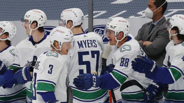May 6, 2021; Edmonton, Alberta, CAN; Vancouver Canucks defensemen Jack Rathbone (3) celebrates a first period goal against the Edmonton Oilers at Rogers Place. Mandatory Credit: Perry Nelson-USA TODAY Sports