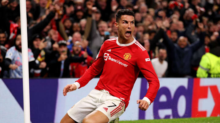 MANCHESTER, ENGLAND - OCTOBER 20: Cristiano Ronaldo of Manchester United celebrates after scoring their side's third goal during the UEFA Champions League group F match between Manchester United and Atalanta at Old Trafford on October 20, 2021 in Manchester, England. (Photo by Naomi Baker/Getty Images)
