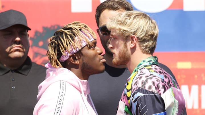 LOS ANGELES, CALIFORNIA - SEPTEMBER 14: Olajide William Olatunji aka KSI (L) and Logan Paul onstage at the KSI VS. Logan Paul 2 - launch press conference held at Gilbert Lindsey Plaza on September 14, 2019 in Los Angeles, California. (Photo by Michael Tran/Getty Images)