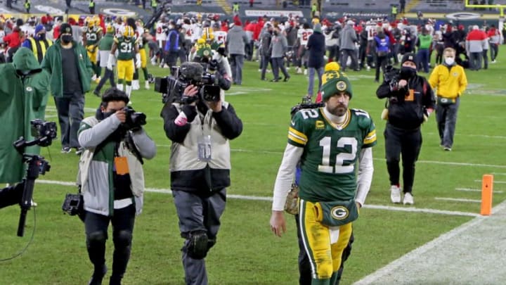 Green Bay Packers quarterback Aaron Rodgers (12) walks off the field fter the Green Bay Packers 31-26 loss to the Tampa Bay Buccaneers in the NFC Championship playoff game Sunday, Jan. 24, 2021 at Lambeau Field in Green Bay, Wis. - Photo by Mike De Sisti / Milwaukee Journal Sentinel via USA TODAY NETWORKPackers Packers25 Mjd 08898