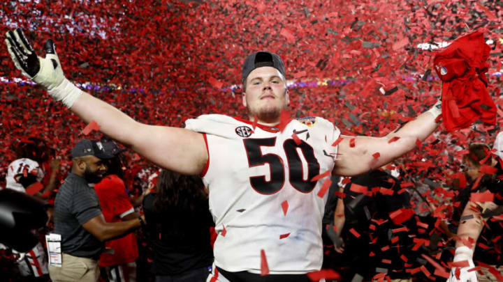 Warren Ericson poses in the confetti after the Georgia Bulldogs defeated the Michigan Wolverines in the Capital One Orange Bowl for the College Football Playoff semifinal game at Hard Rock Stadium on December 31, 2021 in Miami Gardens, Florida. (Photo by Michael Reaves/Getty Images)