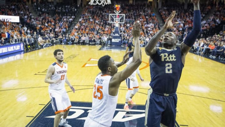 CHARLOTTESVILLE, VA - MARCH 04: Michael Young #2 of the Pittsburgh Panthers goes to the basket past Mamadi Diakite #25 of the Virginia Cavaliers during a game at John Paul Jones Arena on March 4, 2017 in Charlottesville, Virginia. (Photo by Chet Strange/Getty Images)