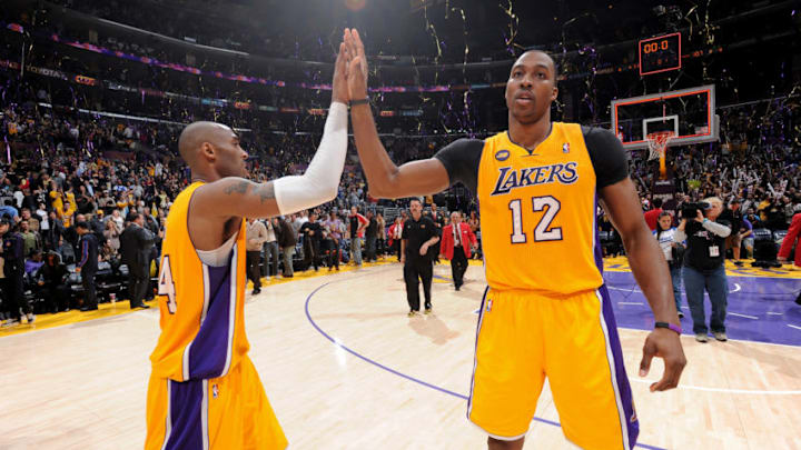 LOS ANGELES, CA - FEBRUARY 22: Kobe Bryant #24 and Dwight Howard #12 of the Los Angeles Lakers celebrate after their team's victory against the Portland Trail Blazers at Staples Center on February 22, 2013 in Los Angeles, California. NOTE TO USER: User expressly acknowledges and agrees that, by downloading and/or using this Photograph, user is consenting to the terms and conditions of the Getty Images License Agreement. Mandatory Copyright Notice: Copyright 2013 NBAE (Photo by Andrew D. Bernstein/NBAE via Getty Images) LOS ANGELES, CA - FEBRUARY 22: Kobe Bryant #24 and Dwight Howard #12 of the Los Angeles Lakers celebrate after their team's victory against the Portland Trail Blazers at Staples Center on February 22, 2013 in Los Angeles, California. NOTE TO USER: User expressly acknowledges and agrees that, by downloading and/or using this Photograph, user is consenting to the terms and conditions of the Getty Images License Agreement. Mandatory Copyright Notice: Copyright 2013 NBAE (Photo by Andrew D. Bernstein/NBAE via Getty Images)