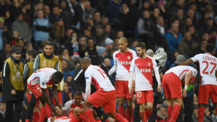 MANCHESTER, ENGLAND – FEBRUARY 21: Radamel Falcao Garcia of AS Monaco (grounded) celebrates as he with team mates as scores their third goal during the UEFA Champions League Round of 16 first leg match between Manchester City FC and AS Monaco at Etihad Stadium on February 21, 2017 in Manchester, United Kingdom. (Photo by Laurence Griffiths/Getty Images)