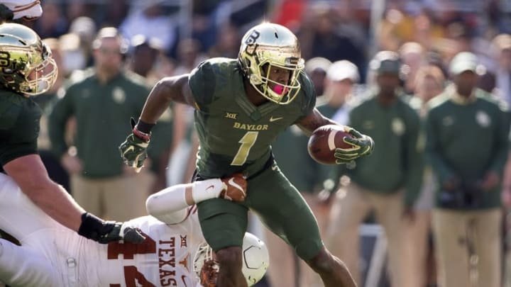 Dec 5, 2015; Waco, TX, USA; Texas Longhorns linebacker Breckyn Hager (44) tackles Baylor Bears wide receiver Corey Coleman (1) during the second half at McLane Stadium. The Longhorns defeat the Bears 23-17. Mandatory Credit: Jerome Miron-USA TODAY Sports