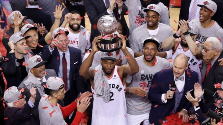 Kawhi Leonard #2 of the Toronto Raptors celebrates with the Eastern Conference Finals trophy after defeating the Milwaukee Bucks 100-94 in game six of the NBA Eastern Conference Finals to advance to the 2019 NBA Finals at Scotiabank Arena on May 25, 2019 in Toronto, Canada. NOTE TO USER: User expressly acknowledges and agrees that, by downloading and or using this photograph, User is consenting to the terms and conditions of the Getty Images License Agreement. (Photo by Claus Andersen/Getty Images)