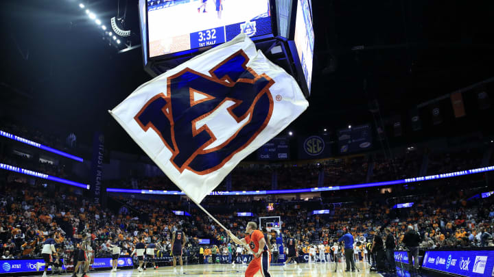 NASHVILLE, TENNESSEE – MARCH 17: Auburn Tigers cheerleader waves a flag. (Photo by Andy Lyons/Getty Images)