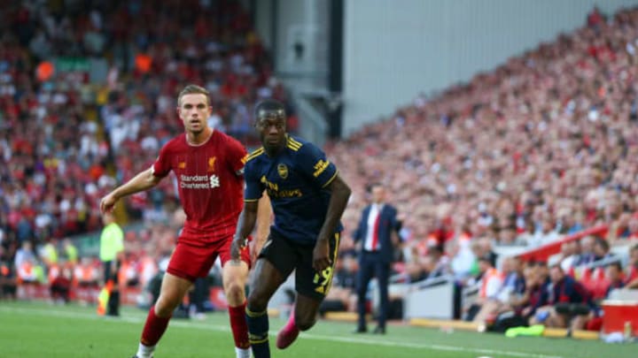 LIVERPOOL, ENGLAND – AUGUST 24: Jordan Henderson of Liverpool and Nicolas Pepe of Arsenal during the Premier League match between Liverpool FC and Arsenal FC at Anfield on August 24, 2019 in Liverpool, United Kingdom. (Photo by Robbie Jay Barratt – AMA/Getty Images)
