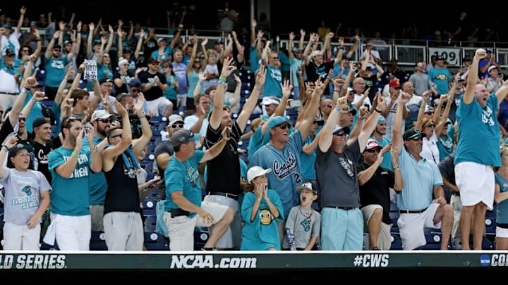 Jun 30, 2016; Omaha, NE, USA; Coastal Carolina Chanticleers fans celebrate after winning the championship against the Arizona Wildcats in game three of the College World Series championship series at TD Ameritrade Park. Mandatory Credit: Bruce Thorson-USA TODAY Sports