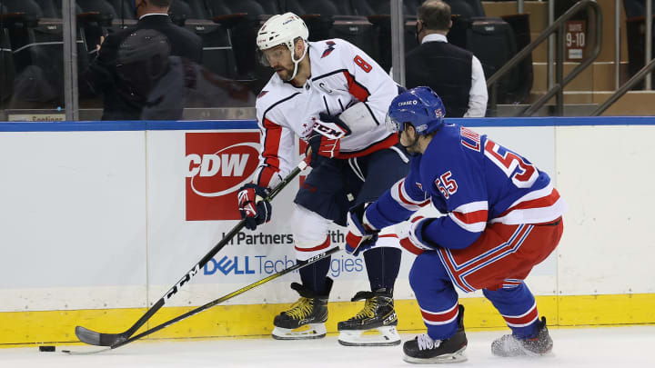 NEW YORK, NEW YORK – MARCH 30: Alex Ovechkin #8 of the Washington Capitals skates against Ryan Lindgren #55 of the New York Rangers during their game at Madison Square Garden on March 30, 2021 in New York City. (Photo by Al Bello/Getty Images)