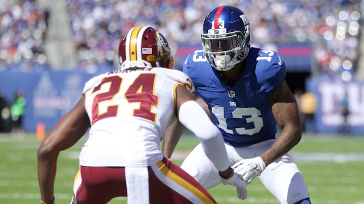 Sep 25, 2016; East Rutherford, NJ, USA; New York Giants wide receiver Odell Beckham Jr. (13) defends Washington Redskins corner back Josh Norman (24) during the first quarter at MetLife Stadium. Mandatory Credit: Brad Penner-USA TODAY Sports