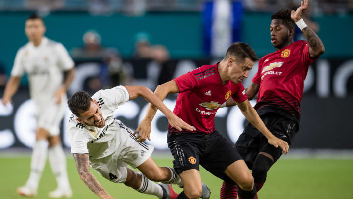 MIAMI, FL – JULY 31: Dani Ceballos #24 of Real Madrid is tripped up during the International Champions Cup match against the Manchester United at Hard Rock Stadium on July 31, 2018 in Miami, Florida. (Photo by Rob Foldy/Getty Images)