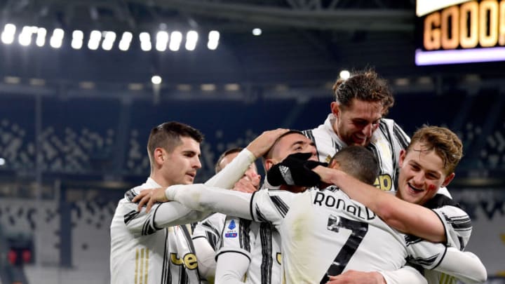 TURIN, ITALY - NOVEMBER 21: Cristiano Ronaldo of Juventus celebrates with Merih Demiral of Juventus, Alvaro Morata of Juventus, Adrien Rabiot of Juventus, Matthijs de Ligt of Juventus during the Italian Serie A match between Juventus v Cagliari Calcio at the Allianz Stadium on November 21, 2020 in Turin Italy (Photo by Mattia Ozbot/Soccrates/Getty Images)