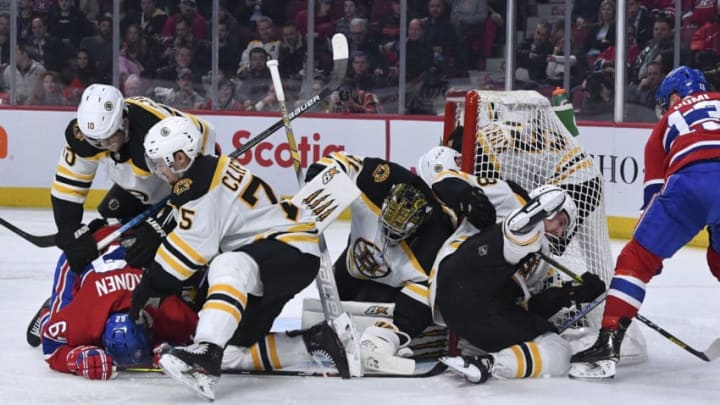 MONTREAL, QC - NOVEMBER 26: Anders Bjork #10 and Connor Clifton #75 of the Boston Bruins defend the net to avoid the Montreal Canadiens goal in the NHL game at the Bell Centre on November 26, 2019 in Montreal, Quebec, Canada. (Photo by Francois Lacasse/NHLI via Getty Images)