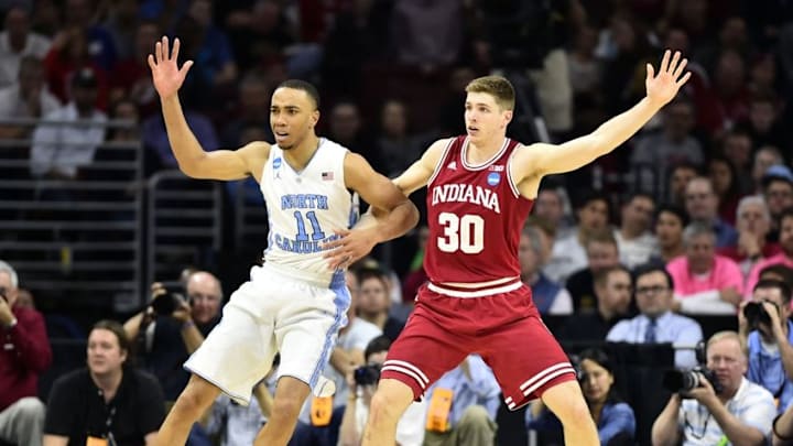 Mar 25, 2016; Philadelphia, PA, USA; North Carolina Tar Heels forward Brice Johnson (11) defends against Indiana Hoosiers forward Collin Hartman (30) during the second half in a semifinal game in the East regional of the NCAA Tournament at Wells Fargo Center. Mandatory Credit: Bob Donnan-USA TODAY Sports