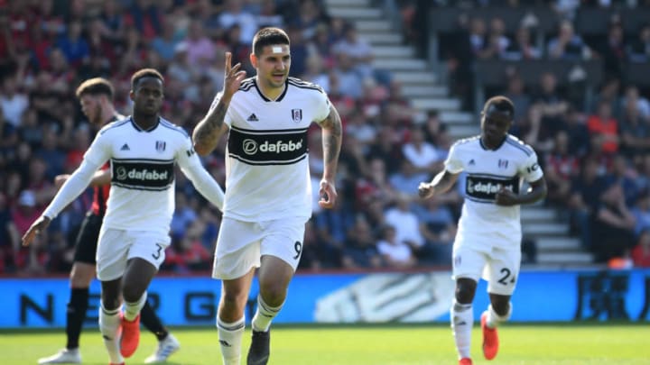 BOURNEMOUTH, ENGLAND – APRIL 20: Aleksandar Mitrovic of Fulham celebrates with team mates after scoring their team’s first goal from the penalty spot during the Premier League match between AFC Bournemouth and Fulham FC at Vitality Stadium on April 20, 2019 in Bournemouth, United Kingdom. (Photo by Alex Davidson/Getty Images)