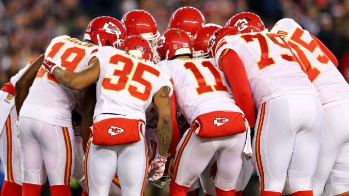 FOXBORO, MA - JANUARY 16: The Kansas City Chiefs huddle in the first quarter against the New England Patriots during the AFC Divisional Playoff Game at Gillette Stadium on January 16, 2016 in Foxboro, Massachusetts. (Photo by Elsa/Getty Images)