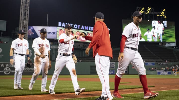 BOSTON, MA - MAY 16: Trevor Story #10 of the Boston Red Sox reacts with Alex Cora #13 of the Boston Red Sox after a 6-3 win over the Houston Astros on May 16, 2022 at Fenway Park in Boston, Massachusetts. (Photo by Maddie Malhotra/Boston Red Sox/Getty Images)
