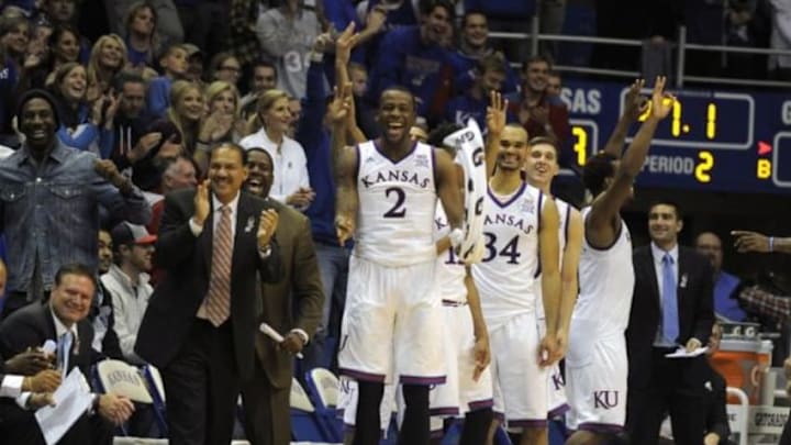 Nov 11, 2014; Lawrence, KS, USA; The Kansas Jayhawks bench celebrates a basket against the Emporia State Hornets in the second half at Allen Fieldhouse. Kansas won the game 109-56. Mandatory Credit: John Rieger-USA TODAY Sports Nov 11, 2014; Lawrence, KS, USA; The Kansas Jayhawks bench celebrates a basket against the Emporia State Hornets in the second half at Allen Fieldhouse. Kansas won the game 109-56. Mandatory Credit: John Rieger-USA TODAY Sports