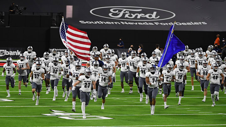 LAS VEGAS, NEVADA - OCTOBER 31: The Nevada Wolf Pack take the field before a game against the UNLV Rebels at Allegiant Stadium on October 31, 2020 in Las Vegas, Nevada. The Wolf Pack defeated the Rebels 37-19. (Photo by Ethan Miller/Getty Images)