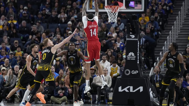 Brandon Ingram #14 of the New Orleans Pelicans shoots over Donte DiVincenzo of the Golden State Warriors during the second-quarter of a game at Chase Center on March 03, 2023. (Photo by Thearon W. Henderson/Getty Images)