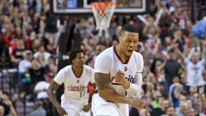 Feb 10, 2016; Portland, OR, USA; Portland Trail Blazers guard Damian Lillard (0) reacts after making a three point basket against the Houston Rockets during the fourth quarter at the Moda Center. Mandatory Credit: Craig Mitchelldyer-USA TODAY Sports