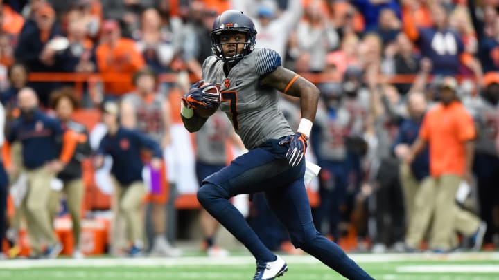 Nov 12, 2016; Syracuse, NY, USA; Syracuse Orange wide receiver Amba Etta-Tawo (7) runs with the ball after a catch on his way to the end zone for a touchdown against the North Carolina State Wolfpack during the third quarter at the Carrier Dome. North Carolina State defeated Syracuse 35-20. Mandatory Credit: Rich Barnes-USA TODAY Sports