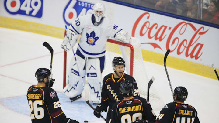 TORONTO, ON- Toronto Marlies goalie Kasimir Kaskisuo stands in the crease after Cleveland Monsters forward Justin Scott ( centre 20) celebrates the first goal of the came on Sunday,October 08, 2018. (Rene Johnston/Toronto Star via Getty Images)