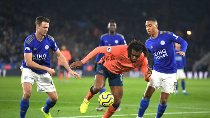 LEICESTER, ENGLAND - DECEMBER 01: Jonny Evans of Leicester City battles for possession with Alex Iwobi of Everton as Youri Tielemans of Leicester City looks on during the Premier League match between Leicester City and Everton FC at The King Power Stadium on December 01, 2019 in Leicester, United Kingdom. (Photo by Michael Regan/Getty Images)