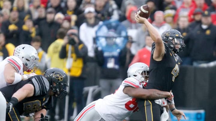IOWA CITY, IOWA- NOVEMBER 04: Quarterback Nathan Stanley #4 of the Iowa Hawkeyes throws during the third quarter under pressure from defensive tackle Dre'mont Jones #86 of the Ohio State Buckeyes on November 04, 2017 at Kinnick Stadium in Iowa City, Iowa. (Photo by Matthew Holst/Getty Images)
