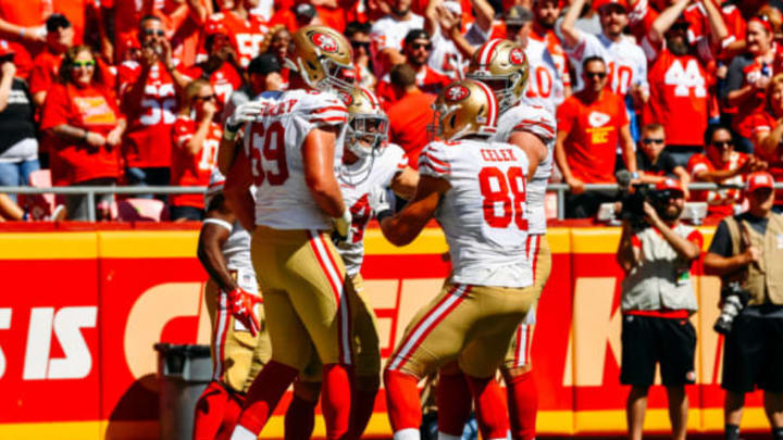 KANSAS CITY, MO – SEPTEMBER 23: Kyle Juszczyk #44 of the San Francisco 49ers celebrates with teammate Mike McGlinchey #69 and Garrett Celek #88 after scoring a touchdown agains the Kansas City Chiefs in the second quarter of the game at Arrowhead Stadium on September 23, 2018 in Kansas City, Missouri. (Photo by Peter Aiken/Getty Images)