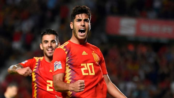 Spain's midfielder Marco Asensio (R) celebrates with Spain's midfielder Dani Ceballos after scoring a goal during the UEFA Nations League A group 4 football match between Spain and Croatia at the Manuel Martinez Valero stadium in Elche on September 11, 2018. (Photo by JOSE JORDAN / AFP) (Photo credit should read JOSE JORDAN/AFP/Getty Images)