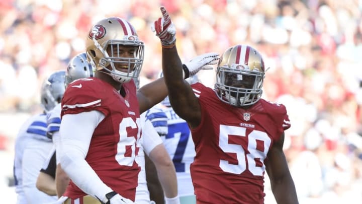 August 23, 2015; Santa Clara, CA, USA; San Francisco 49ers defensive end Arik Armstead (69, left) and outside linebacker Eli Harold (58) celebrate during the second quarter against the Dallas Cowboys. Mandatory Credit Kyle Terada USA TODAY Sports