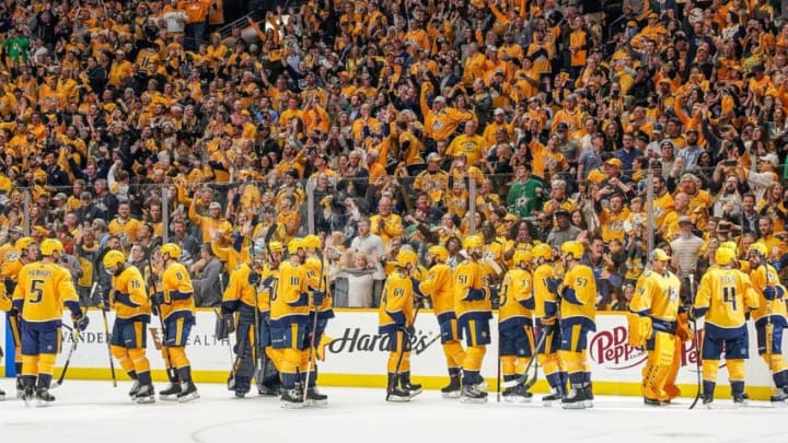 NASHVILLE, TN - APRIL 13: The Nashville Predators celebrate a 2-1 overtime win against the Dallas Stars in Game Two of the Western Conference First Round during the 2019 NHL Stanley Cup Playoffs at Bridgestone Arena on April 13, 2019 in Nashville, Tennessee. (Photo by John Russell/NHLI via Getty Images)