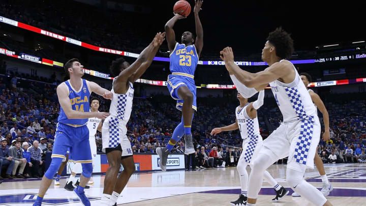 NEW ORLEANS, LA – DECEMBER 23: Prince Ali #23 of the UCLA Bruins shoots against Nick Richards #4 of the Kentucky Wildcats and Hamidou Diallo #3 during the first half of the CBS Sports Classic at the Smoothie King Center on December 23, 2017 in New Orleans, Louisiana. (Photo by Jonathan Bachman/Getty Images)