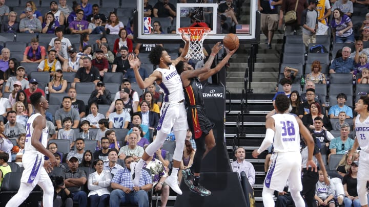 SACRAMENTO, CA – JULY 5: Derrick Jones Jr. #5 of the Miami Heat goes to the basket against Marvin Bailey III #35 of the Sacramento Kings during the 2018 Summer League at the Golden 1 Center on July 5, 2018 in Sacramento, California. NOTE TO USER: User expressly acknowledges and agrees that, by downloading and or using this photograph, User is consenting to the terms and conditions of the Getty Images License Agreement. Mandatory Copyright Notice: Copyright 2018 NBAE (Photo by Rocky Widner/NBAE via Getty Images)