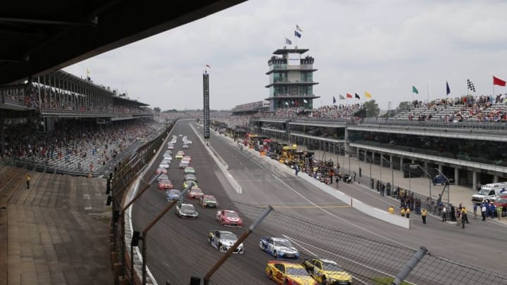 Jul 26, 2015; Indianapolis, IN, USA; NASCAR Sprint Cup driver Carl Edwards leads the field on the pace lap for the start of the Crown Royal 400 at Indianapolis Motor Speedway. Mandatory Credit: Brian Spurlock-USA TODAY Sports