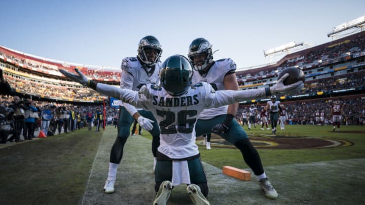 LANDOVER, MD - DECEMBER 15: Miles Sanders #26 of the Philadelphia Eagles celebrates with J.J. Arcega-Whiteside #19 and Dallas Goedert #88 after catching a pass for a touchdown against the Washington Redskins during the second half at FedExField on December 15, 2019 in Landover, Maryland. (Photo by Scott Taetsch/Getty Images)