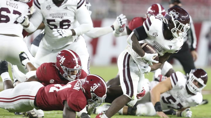 Oct 31, 2020; Tuscaloosa, Alabama, USA; Alabama linebacker Will Anderson Jr. (31) makes a shoe string tackle on Mississippi State running back Jo’quavious Marks (21) at Bryant-Denny Stadium during the second half of Alabama’s 41-0 win over Mississippi State. Mandatory Credit: Gary Cosby Jr/The Tuscaloosa News via USA TODAY Sports