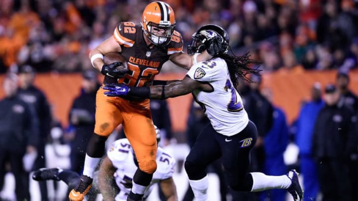 CLEVELAND, OH - NOVEMBER 30: Gary Barnidge #82 of the Cleveland Browns carries the ball in front of Kendrick Lewis #23 of the Baltimore Ravens during the second quarter at FirstEnergy Stadium on November 30, 2015 in Cleveland, Ohio. (Photo by Jason Miller/Getty Images)