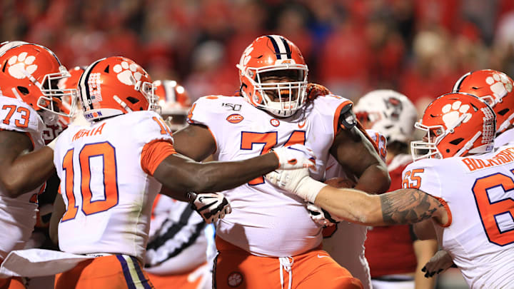 RALEIGH, NORTH CAROLINA – NOVEMBER 09: John Simpson #74 of the Clemson Tigers reacts after running for a touchdown against the North Carolina State Wolfpack during their game at Carter-Finley Stadium on November 09, 2019 in Raleigh, North Carolina. (Photo by Streeter Lecka/Getty Images)