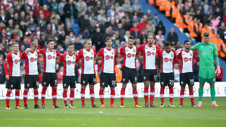 BRIGHTON, ENGLAND - OCTOBER 29: Southampton players line up for a minute's silence ahead of Remembrance Sunday prior to the Premier League match between Brighton and Hove Albion and Southampton at Amex Stadium on October 29, 2017 in Brighton, England. (Photo by Steve Bardens/Getty Images)