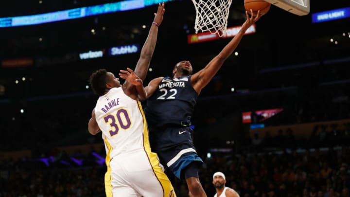 LOS ANGELES, CA - DECEMBER 25: Andrew Wiggins #22 of the Minnesota Timberwolves goes in for a layup against Julius Randle #30 of the Los Angeles Lakers during the first half of the game at the Staples Center on December 25, 2017 in Los Angeles, California. NOTE TO USER: User expressly acknowledges and agrees that, by downloading and or using this photograph, User is consenting to the terms and conditions of the Getty Images License Agreement. (Photo by Josh Lefkowitz/Getty Images)